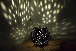 Dodecahedron Shape Geometric Lamp Projecting Christmas Stars Shadows