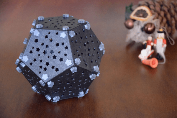 Dodecahedron Shape Geometric Lamp Projecting Christmas Stars Shadows