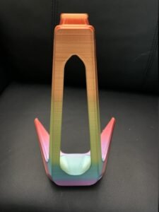SPECIAL ADDITION Headphone Stand RAINBOW VARIANT Minimalistic Headphone Stand is a heavy-duty universal headphones stand. While weighing about 167 gm; the sturdy infill, one-piece construction, and even weight distribution allow it to support even the heaviest sets of headphones with ease.