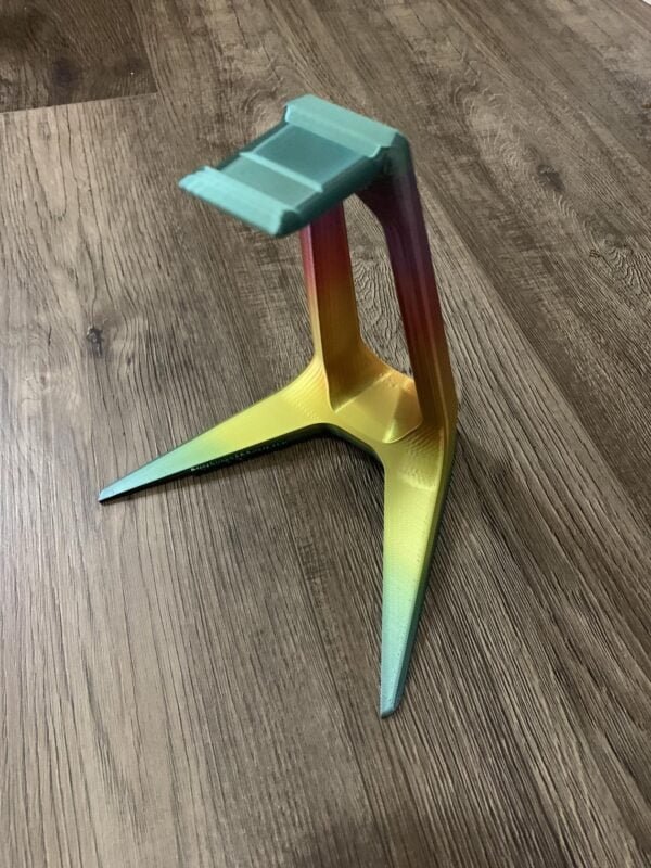 SPECIAL ADDITION Headphone Stand RAINBOW VARIANT Minimalistic Headphone Stand is a heavy-duty universal headphones stand. While weighing about 167 gm; the sturdy infill, one-piece construction, and even weight distribution allow it to support even the heaviest sets of headphones with ease.