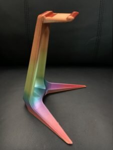 SPECIAL ADDITION Headphone Stand RAINBOW VARIANT Minimalistic Headphone Stand is a heavy-duty universal headphones stand. While weighing about 167 gm; the sturdy infill, one-piece construction, and even weight distribution allow it to support even the heaviest sets of headphones with ease.