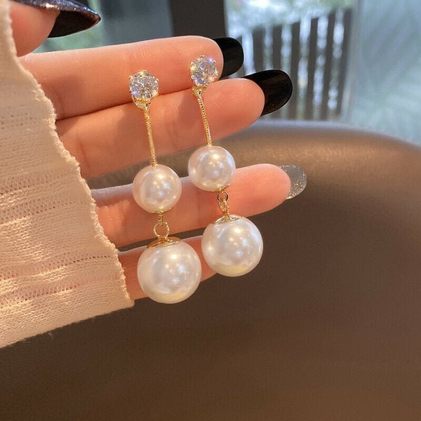 Trendy long drop pearl earrings 
